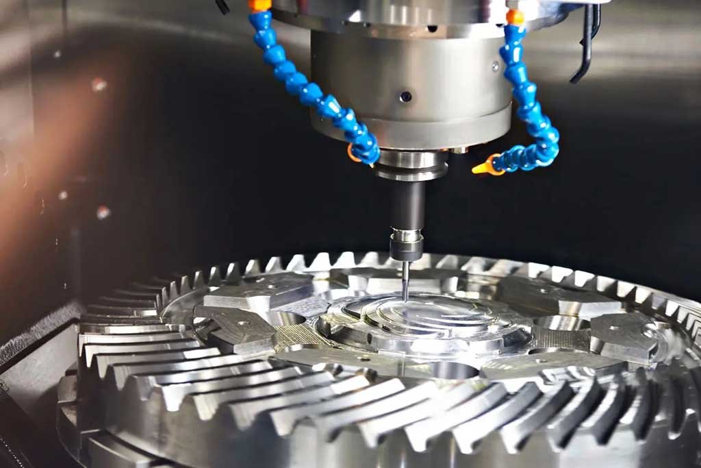 CNC machine tool precision machining a metal gear component.